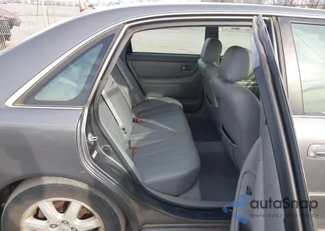 2003 Toyota Avalon Xl z USA, uszkodzony, nr VIN 4T1BF28B93U322377